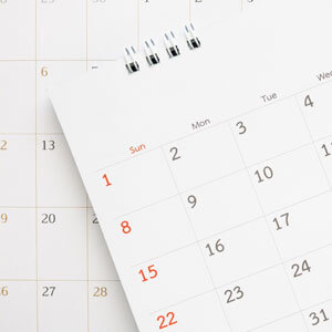 Calendar Page Close Up On Blue Background Business Planning Appo